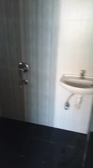 Bathroom in 1 BHK Apartment at Gala Lifestyle Pride Residency, Kasarvadavali – for Sale