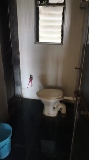 Bathroom in 1 BHK Apartment at Gala Lifestyle Pride Residency, Kasarvadavali – for Sale