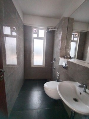 Bathroom in 4 BHK Apartment at Omkar Alta Monte, Malad East – for Rent