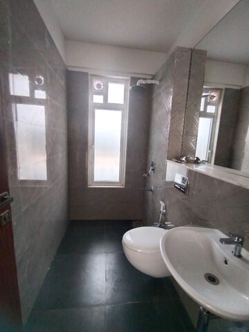 Bathroom in 4 BHK Apartment at Omkar Alta Monte, Malad East – for Rent