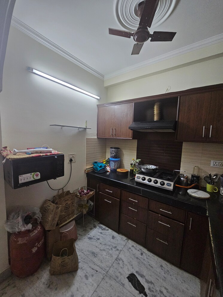 Kitchen, mahavir enclave 1 3 Bedroom 112 Sq.Yd. Builder Floor In Mahavir Enclave 1 Delhi 9548735