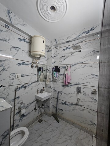 Bathroom in 3 BHK Builder Floor at Mahavir Enclave 1 – for Sale