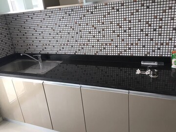 Kitchen in 2 BHK Apartment at Omkar Alta Monte, Malad East – for Rent