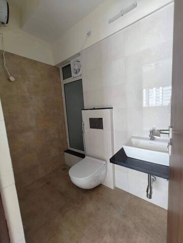 Bathroom in 1 BHK Apartment at Omkar Signet, Malad East – for Rent