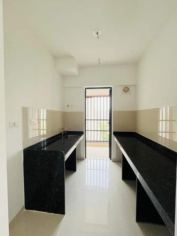 Kitchen in 2.5 BHK Apartment at Lodha Lakeshore Greens, Dombivli East – for Rent