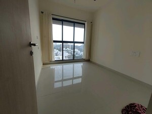 Room in 2 BHK Apartment at Andheri CHS, Andheri West – for Rent