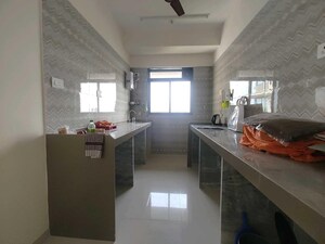 Kitchen in 2 BHK Apartment at Andheri CHS, Andheri West – for Rent