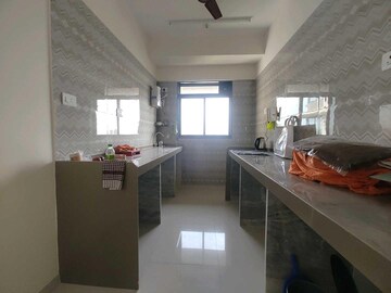 Kitchen in 2 BHK Apartment at Andheri CHS, Andheri West – for Rent