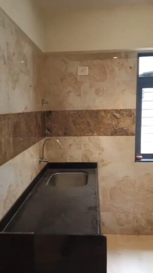 Kitchen in 2 BHK Apartment at Dn Nagar – for Rent