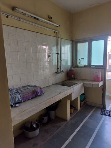 Kitchen in 2 BHK Apartment at 150 Feet Ring Road – for Sale