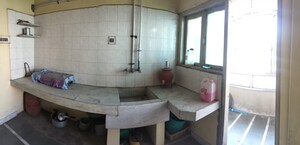 Kitchen in 2 BHK Apartment at 150 Feet Ring Road – for Sale