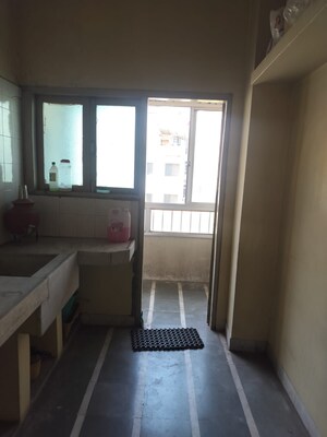 Kitchen in 2 BHK Apartment at 150 Feet Ring Road – for Sale