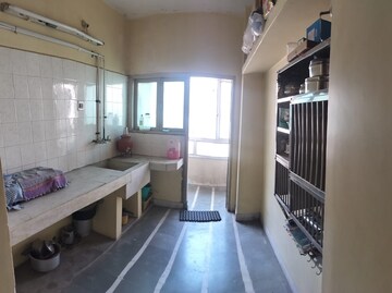 Kitchen in 2 BHK Apartment at 150 Feet Ring Road – for Sale