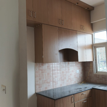 Kitchen in 4 BHK Apartment at Amrapali Crystal Homes, Sector 76 – for Rent