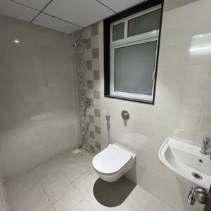 Bathroom in 2 BHK Apartment at Roshan Milestone, Mumbai Bangalore Highway – for Sale