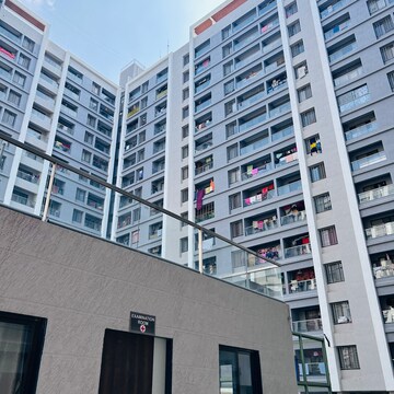 2 BHK Apartment – Exterior View View at Roshan Milestone, Mumbai Bangalore Highway - for Sale