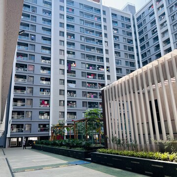 2 BHK Apartment – Exterior View View at Roshan Milestone, Mumbai Bangalore Highway - for Sale