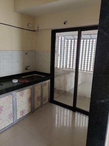 Kitchen in 2 BHK Apartment at Mashyakh Tower, Malad West – for Sale