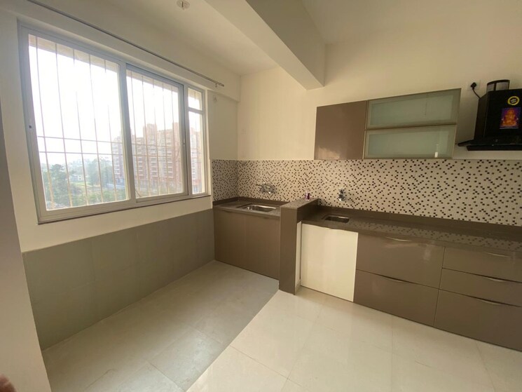 Kitchen, legacy-imperial 2 Bedroom 745 Sq.Ft. Apartment In Kiwale Pune 9549183