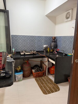Kitchen in 2 BHK Apartment at Lodha Quality Home Tower 5, Majiwada – for Rent