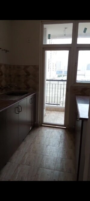 Kitchen in 2 BHK Apartment at Amrapali Riverview, Amrapali Leisure Valley – for Rent