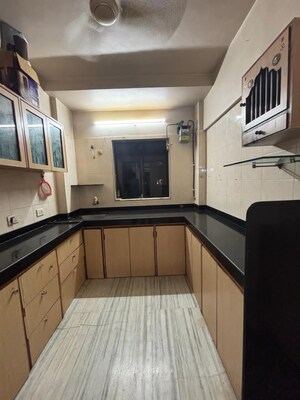 Kitchen in 1 BHK Apartment at Krishna Residency Atmaram Compound, Malad West – for Rent