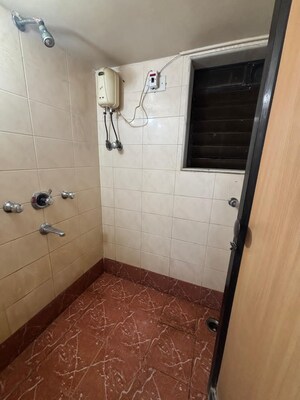 Bathroom in 1 BHK Apartment at Krishna Residency Atmaram Compound, Malad West – for Rent