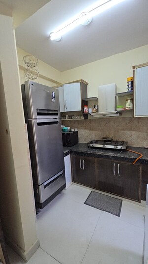 Kitchen in 2.5 BHK Apartment at Eureka Diya Green City, Raj Nagar Extension – for Sale