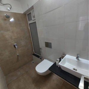 Bathroom in 2 BHK Apartment at Omkar Signet, Malad East – for Rent