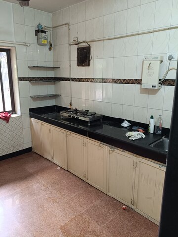 Kitchen in 2 BHK Apartment at Shiv Kirti Apartment, Malad West – for Rent