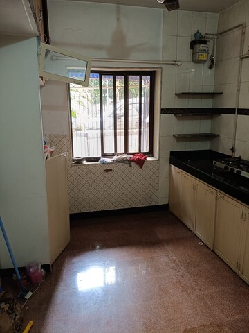 Kitchen in 2 BHK Apartment at Shiv Kirti Apartment, Malad West – for Rent