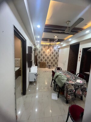 Living Room in 1 RK Apartment at Nimbus The Golden Palm, Sector 168 – for Rent