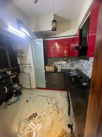 Kitchen in 1 RK Apartment at Nimbus The Golden Palm, Sector 168 – for Rent