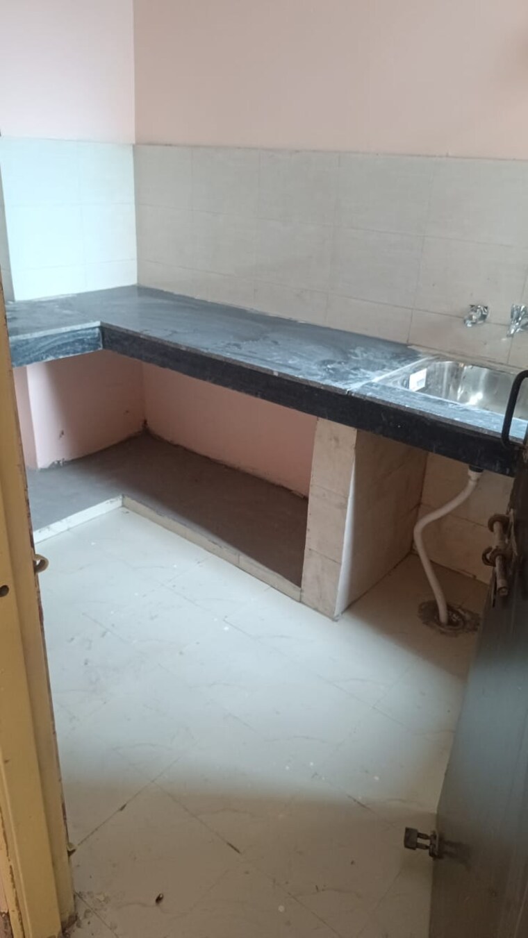 Kitchen, gnida-lohiya-enclave-omicron-1a 2 Bedroom 58 Sq.Mt. Apartment In Omicron 1a Greater Noida Greater Noida 9549535