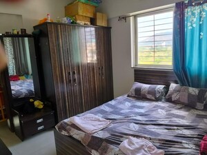 Bedroom in 2 BHK Apartment at Shreyas Palladium Grand, Dhanori – for Rent