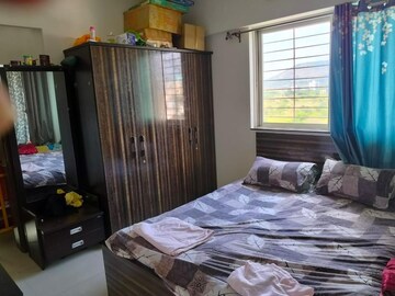 Bedroom in 2 BHK Apartment at Shreyas Palladium Grand, Dhanori – for Rent