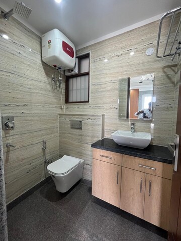 Bathroom in 3 BHK Apartment at Freedom Fighters Enclave – for Rent