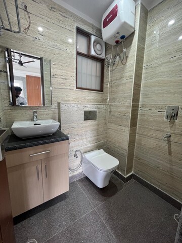 Bathroom in 3 BHK Apartment at Freedom Fighters Enclave – for Rent