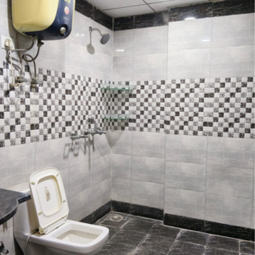 Bathroom in 4 BHK Apartment at Saya Gold Avenue, Vaibhav Khand – for Rent