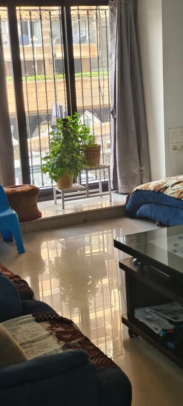 Living Room in 3 BHK Apartment at Raheja Crest 1 Co operative Housing Society Limite, Andheri West – for Sale