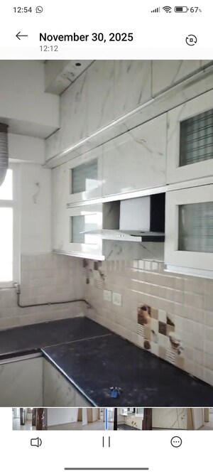 Kitchen in 2 BHK Apartment at Gaur City 2 - 14th Avenue, Sector 16c Greater Noida – for Rent