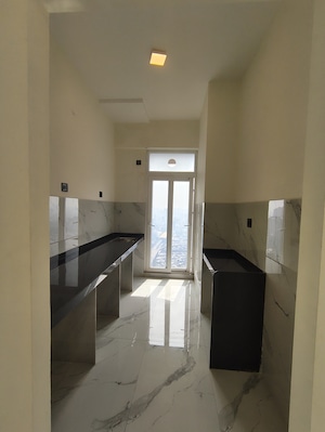 Kitchen in 1 BHK Apartment at Ruparel Sky Green, Kandivali West – for Sale