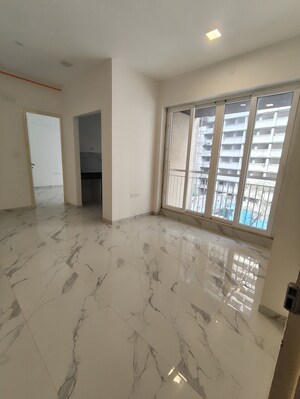 Building Lobby in 2 BHK Apartment at Ruparel Sky Green, Kandivali West – for Sale