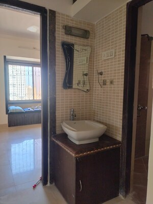 Bathroom in 2 BHK Apartment at Regency Towers, Kavesar – for Rent