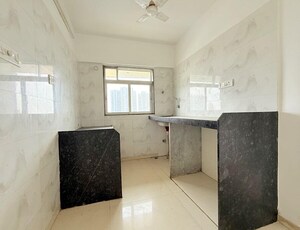 Kitchen in 3 BHK Apartment at Millionaire Heritage, Andheri West – for Rent