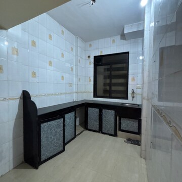 Kitchen in 2 BHK Apartment at Omkar Krupa Apartment, Panvel Sector 15a – for Sale