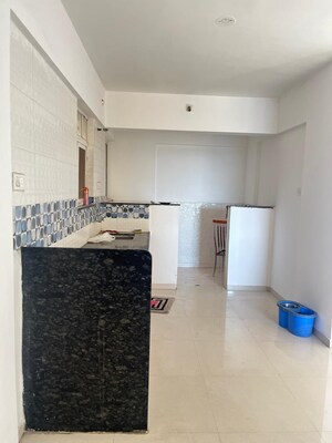 Kitchen in 2 BHK Apartment at Dhanashree Aashiyana, Undri – for Rent
