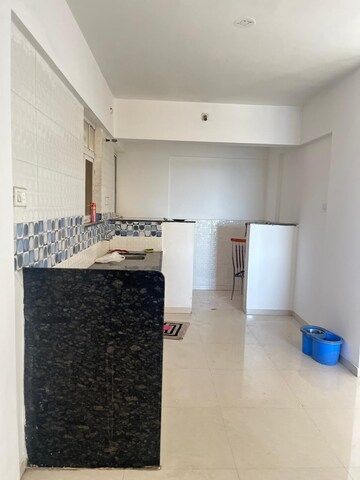 Kitchen in 2 BHK Apartment at Dhanashree Aashiyana, Undri – for Rent