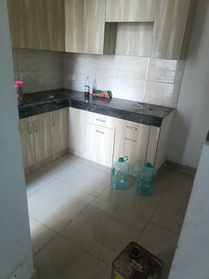 Kitchen in 3 BHK Apartment at Ajnara Le Garden, Sector 16b Greater Noida – for Rent