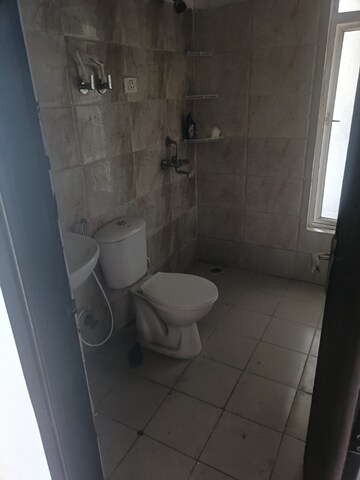 Bathroom in 3 BHK Apartment at Ajnara Le Garden, Sector 16b Greater Noida – for Rent